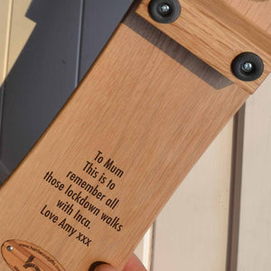 Oak Boot Jack engraved with 'Birth Flower'design and the year of birth for each child